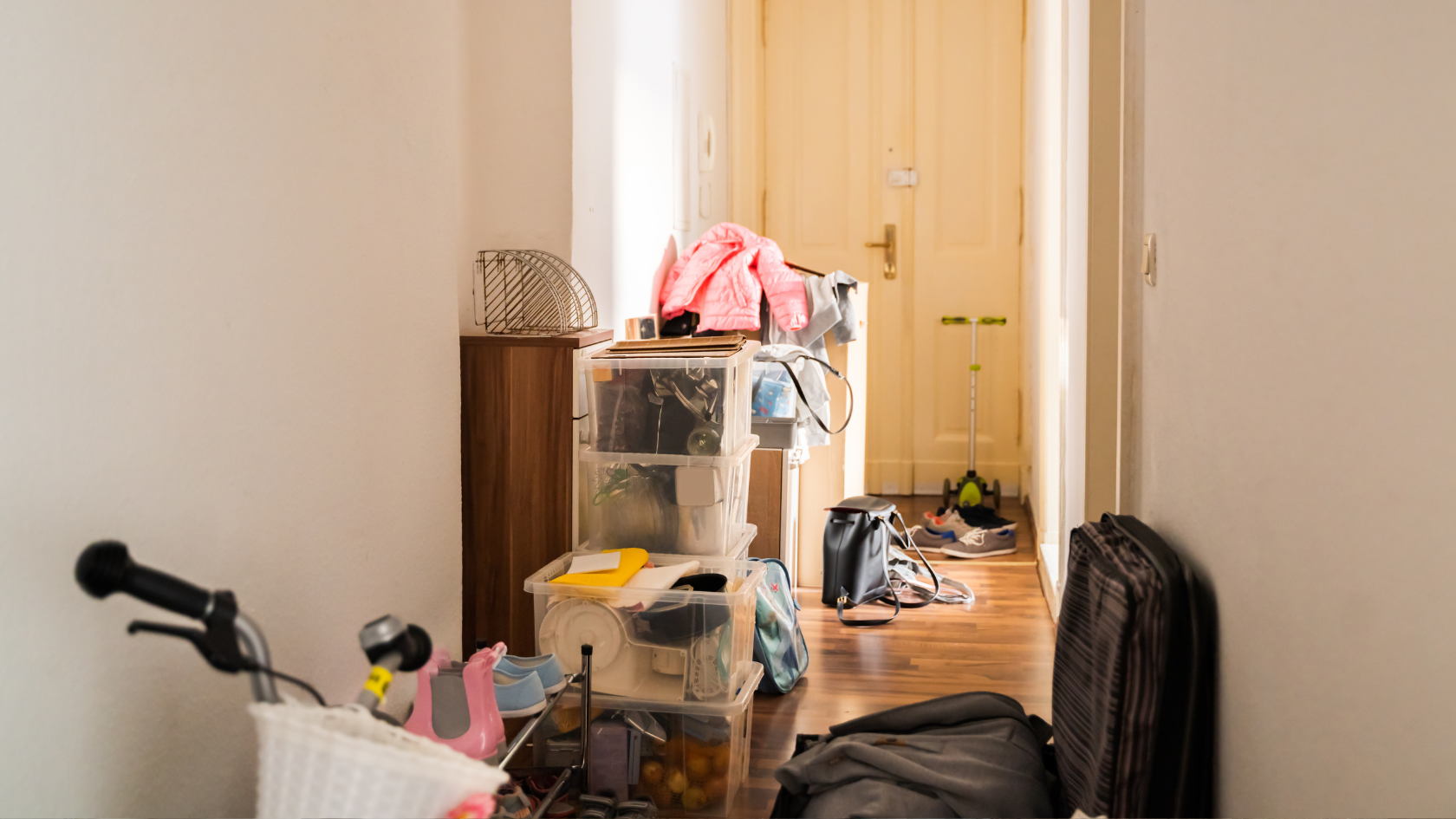 A room filled with lots of clutter next to a door