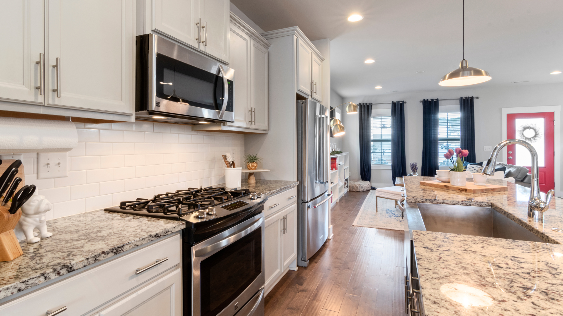 A kitchen with a stove top oven next to a counter